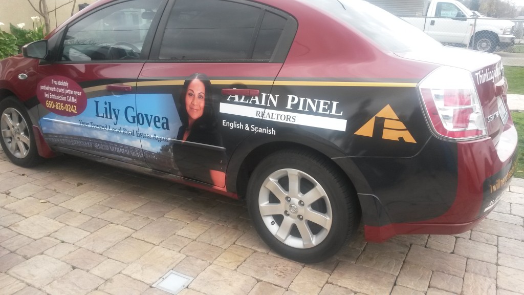 Lily Govea of Alain Pinel Realty Nissan Sentra partial wrap.